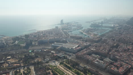Aerial-panoramic-view-of-city-and-sea-coast.-Estacion-de-Francia-train-station-and-harbour.-Barcelona,-Spain