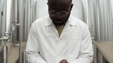 man grabbing seeds on hand