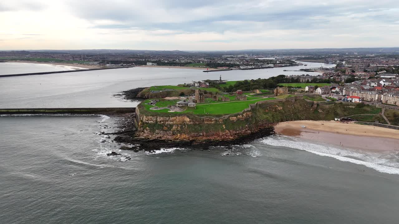 Aerial drone view tynemouth beach seaside north east england uk town british beach city tyne and wear Priory and Castle North Tyneside