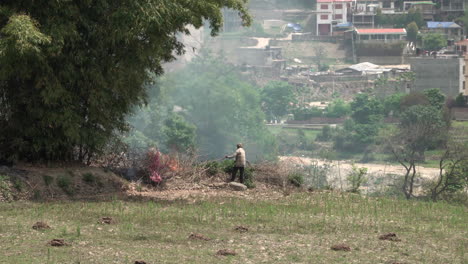 a small brush fire on a hillside.
