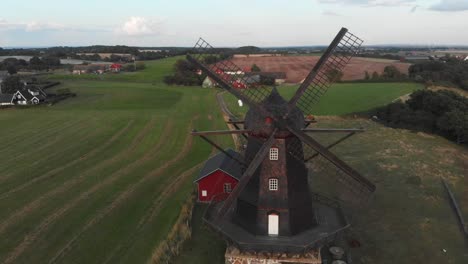 Aerial-view-of-Bräcke-Mölla-at-Nyhamnsläge-during-sunset,-Sweden