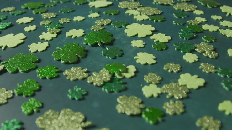 Studio Shot Of Green Shamrock Shapes On Background To Celebrate St Patricks Day