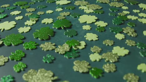 Studio-Shot-Of-Green-Shamrock-Shapes-On-Background-To-Celebrate-St-Patricks-Day