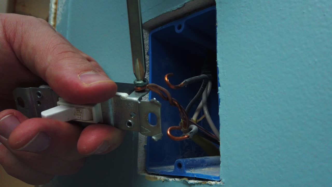 Removing an old light switch from a ground wire