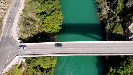 bridge across clutha river on new zealand countryside