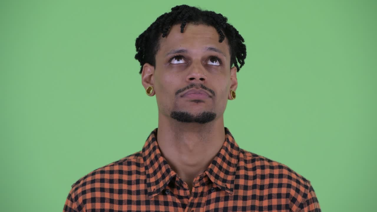 Young handsome African man with dreadlocks