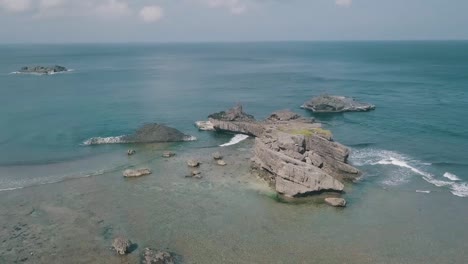 breathtaking aerial video of a cinematic wonderland of alapad rock formation in basco batanes in the philippines