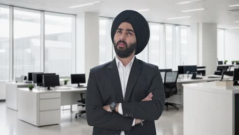 confused sikh indian businessman thinking