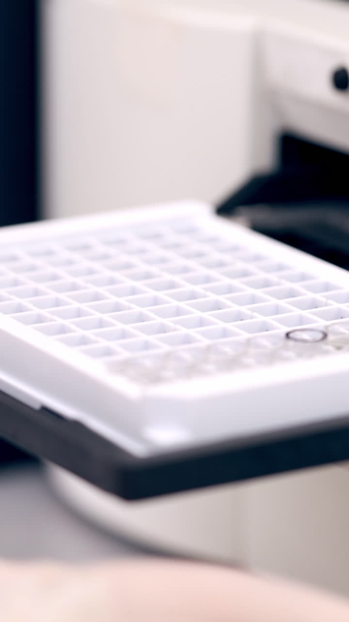 Automated machine in the laboratory. Modern apparatus in pharmacology. Special device for diagnostic research of samples. Vertical video