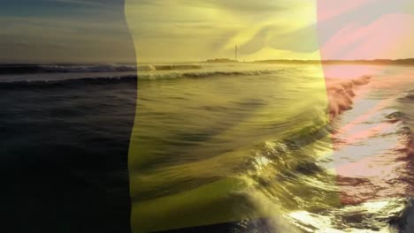 Animation-of-flag-of-belgium-blowing-over-beach-seascape