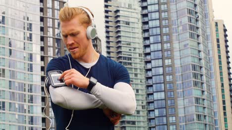 man listening to music while jogging in the city 4k 4k