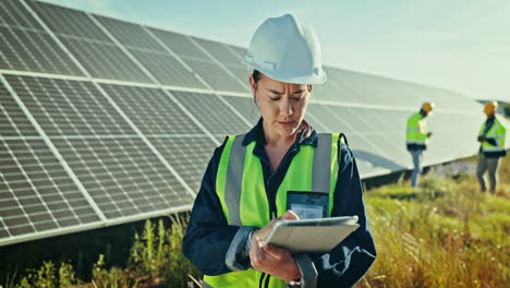 Woman,-tablet-and-solar-panels-inspection