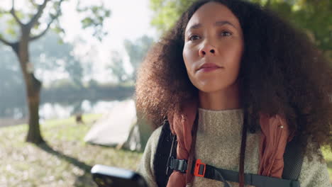 Camping,-location-and-woman-with-phone-in-forest