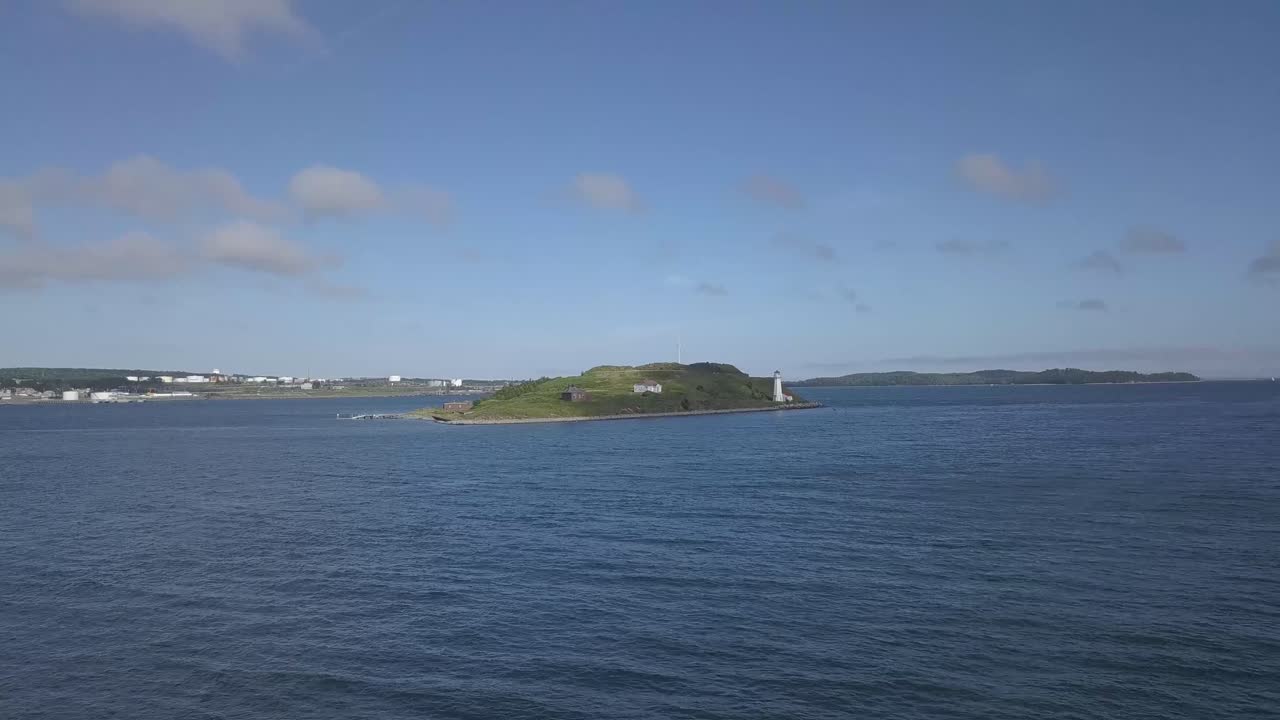 Island with a lighthouse in the sea