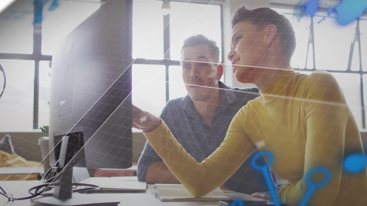 Woman reaching pointing at screen, initiating tech review guiding colleague with blue nodes passing