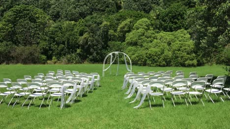 wedding ceremony on green lawn in the garden