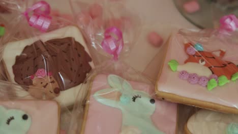 homemade glazed animal cookies wrapped in plastic as presents