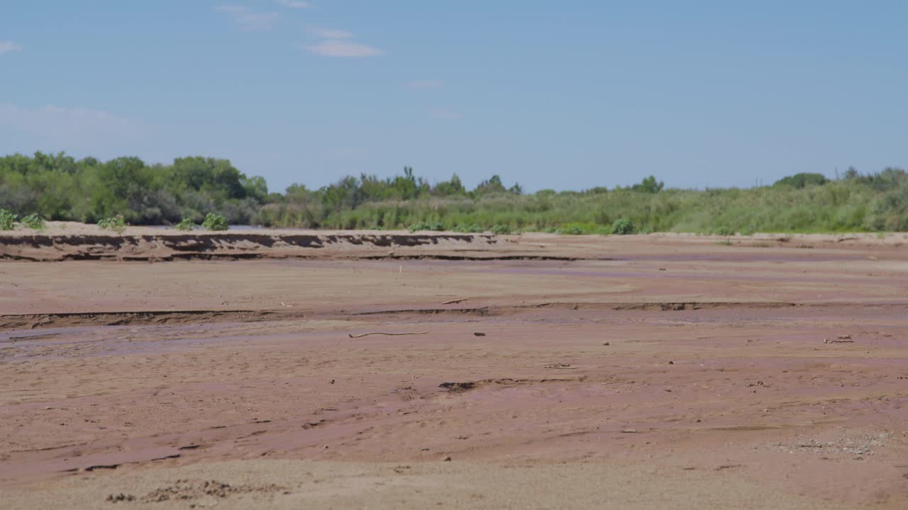Steady shot of dried up Rio Grande river in New Mexico