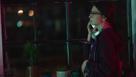 young caucasian business woman working late using smartphone chatting phone call conversation discussing deadline female entrepreneur talking on cellphone in office at night