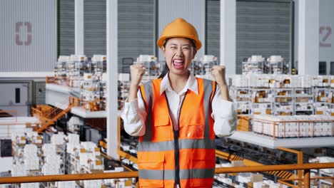 happy factory worker celebrating success