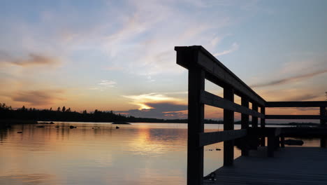 pier and seascape at sunset, visby, gotland, sweden