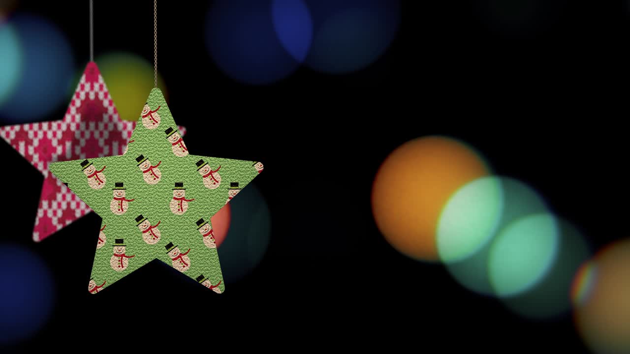 los adornos de las estrellas de navidad se mueven en el fondo de bokeh.