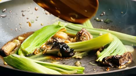 close-up of cooking vegetables in a wok