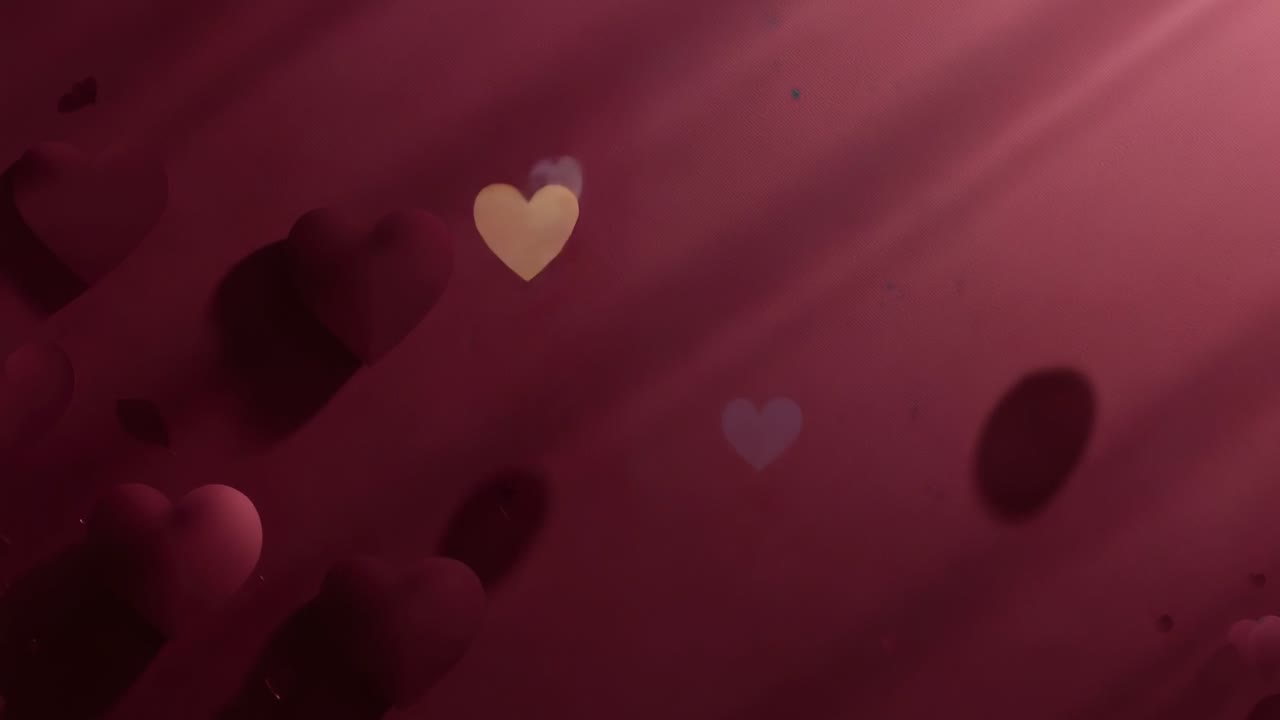 Drifting stylized heart group moving across maroon gradient, diagonal light beams initiating drift
