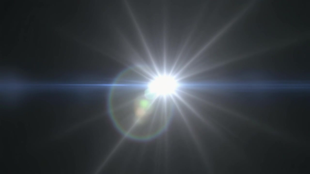 Effetto lens flare bianco brillante su sfondo scuro