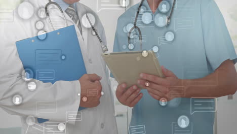 doctors holding clipboards with social media icons animation over them