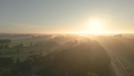 misty sunrise over rural landscape