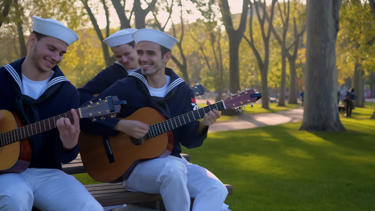 Søfolk spiller guitar i parken