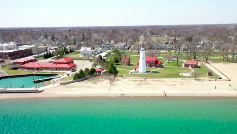 fort gratiot lighthouse in port huron, michigan with drone video moving sideways