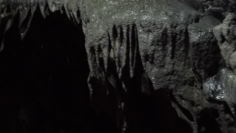 stalactide cave rock with dropping water