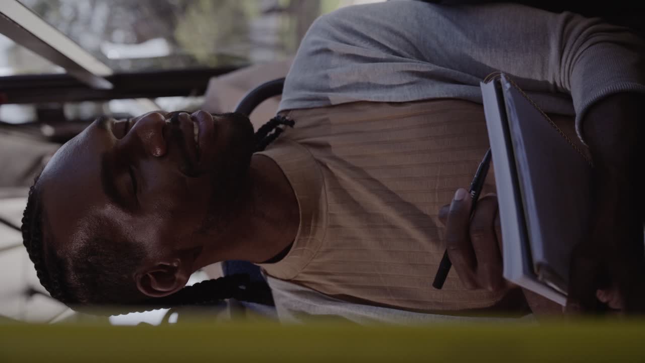 Man with Notebook and Pen Showing Diverse Expressions