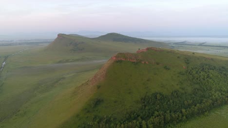 aerial view of mountain landscape with fog