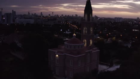 aerial view of a church at sunset