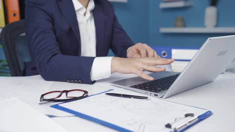 Office worker man&#039;s hands hurt from working hard.
