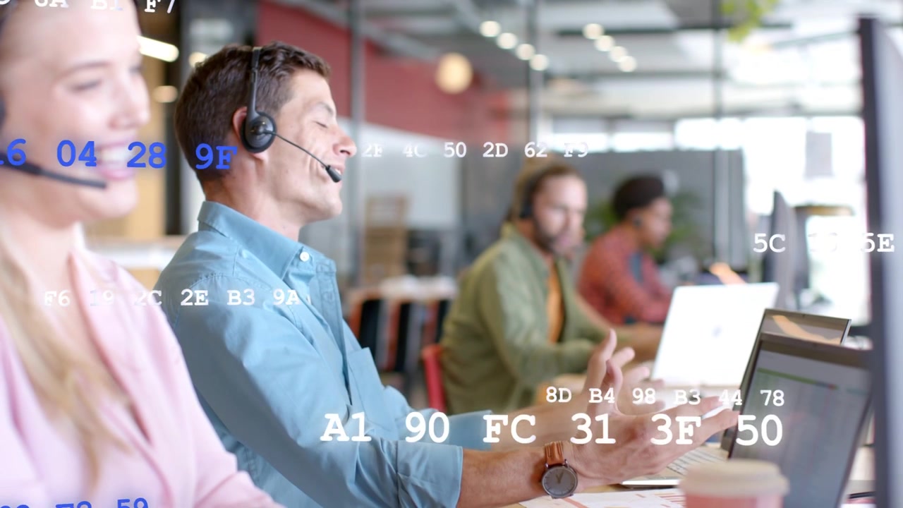Male call agent answering call, gesturing, resolving issue, faint code overlay drifting across team