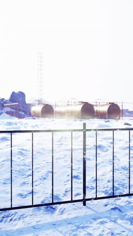 bright winter day at a remote research station surrounded by snow and ice