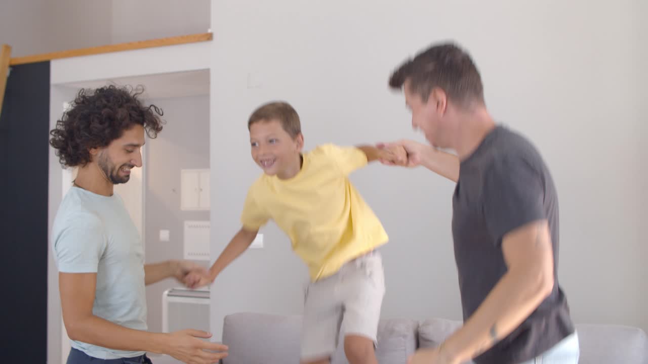 Joyful active boy enjoying home activity