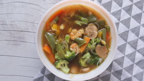 vegetable soup in a bow on table , top view