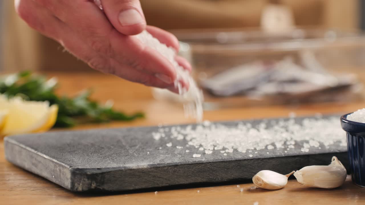 Seasoning Fish with Salt