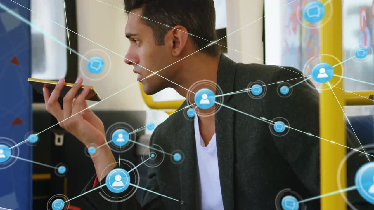 Animation of network of connections with icons over caucasian man using smartphone