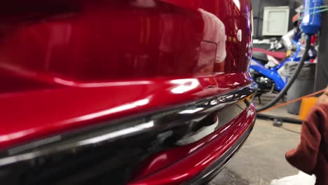 car detailing of a red vehicle
