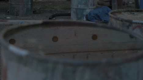 reflection of porthole windows of sapele carvel built boat in water of barrel rack focus