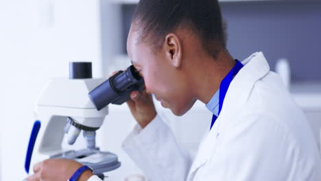 black woman, scientist and face with microscope