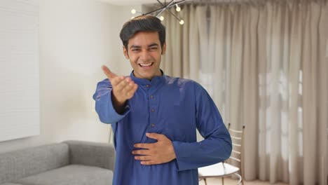 Indian-boy-laughing-and-making-fun