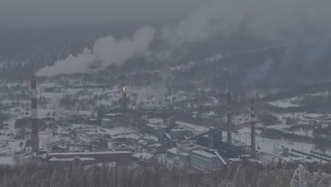 industrial plant in snowy landscape