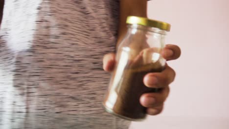 Young-Man-making-coffee-with-coffee-powder